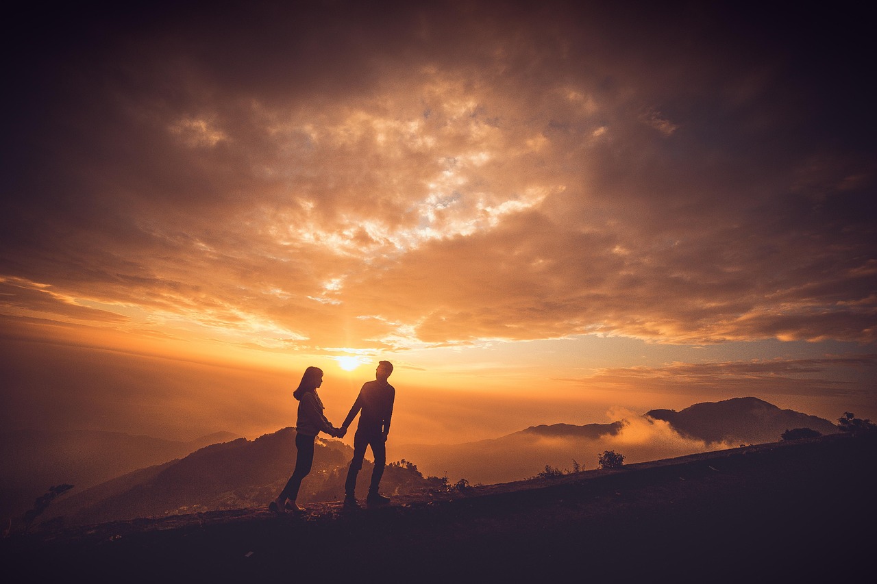 Sunset, couple, sky — Thrilling Experiences: Adventure Sports during Your Gap Year in Latin America