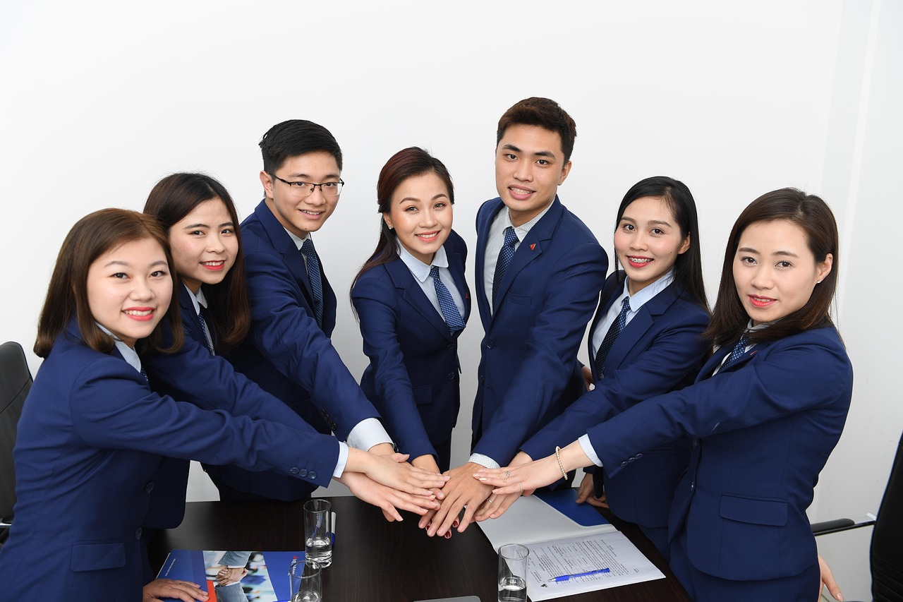 Team, business, asians — "Top Loft Ladders to Make Attic Access Easier and Safer"